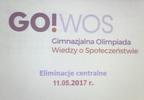 Plansza informacyjna Gimnazjalnej Olimpiady Wiedzy o Społeczeństwie